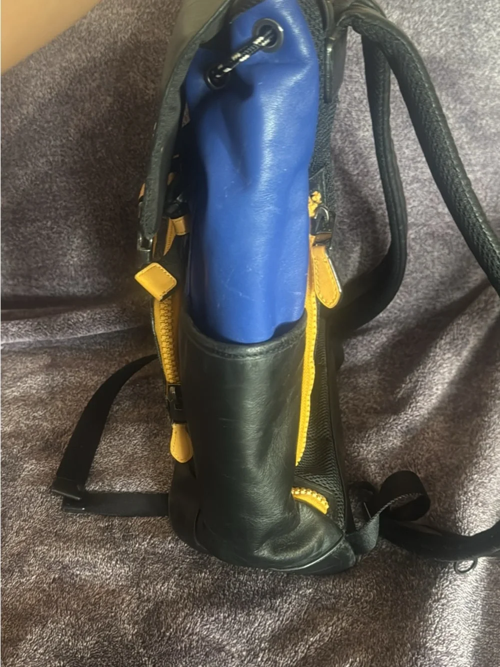 Coach Men's Blue and Black Logo Panel Flap Backpack with Gold Accents